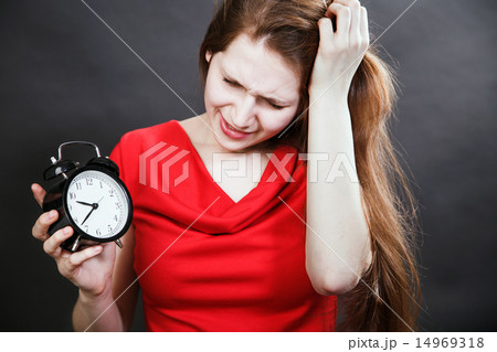 girl in red dress late with alarm clock girl in red dress late with alarm clock 14969318