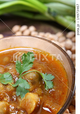 indian spicy chana masala with raw chickpeas indian spicy chana masala with raw chickpeas 14973467
