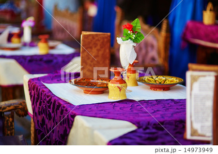 Table in Moroccan street restaurant Table in Moroccan street restaurant 14973949