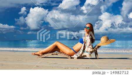 Woman in bikini on beach at Seychelles Woman in bikini on beach at Seychelles 14982712
