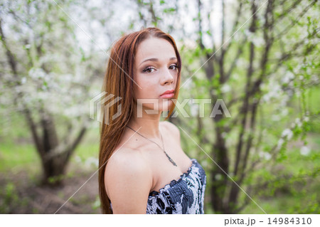 Lady in spring orchard Lady in spring orchard 14984310