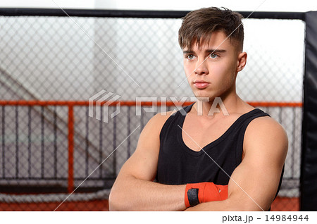 Sportsmen in a fighting cage 14984944