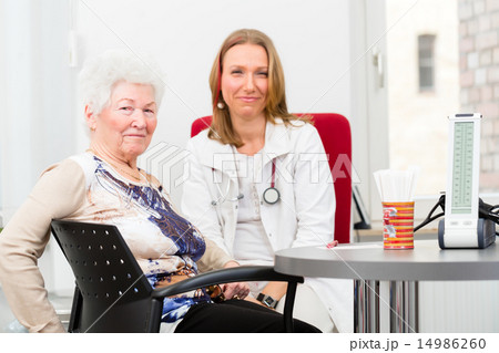 Doctor seeing senior patient in practice Doctor seeing senior patient in practice 14986260