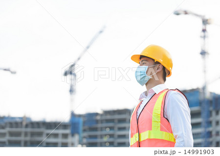 Chinese construction worker looking forward Chinese construction worker looking forward 14991903