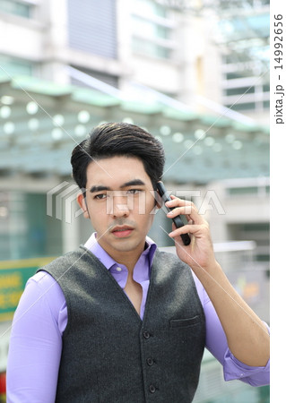 Man serious talk on cellphone Man serious talk on cellphone 14992656