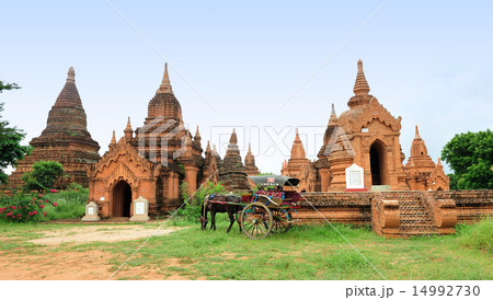 The temples and the horse carriage in Bagan The temples and the horse carriage in Bagan 14992730