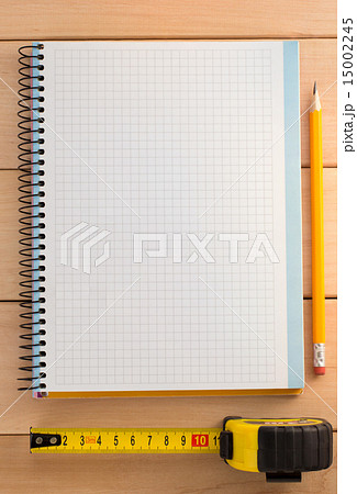 tape measure and pencil on wood 15002245