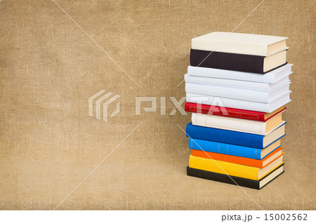 Pyramid from books on a canvas 15002562