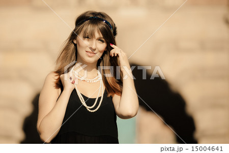 Flapper girl woman in1920s style portrait outdoor Flapper girl woman in1920s style portrait outdoor 15004641