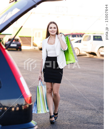Woman after shopping 15007644