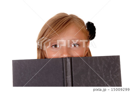Girl reading book. 15009299