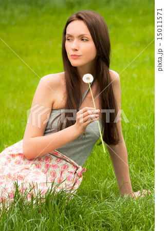 Girl with dandelion 15011571