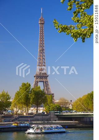 Eiffel Tower with boat on Seine in Paris, France Eiffel Tower with boat on Seine in Paris, France 15011686