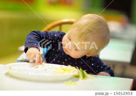 Toddler boy playing with food Toddler boy playing with food 15012953