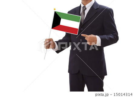Businessman hand showing Kuwaiti Flag 15014314