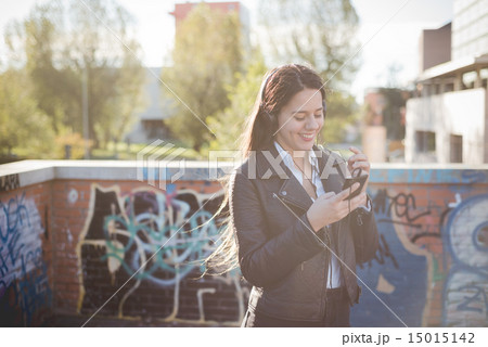 young beautiful long hair woman in town 15015142