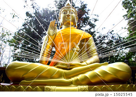close up white rope in buddha statue hand close up white rope in buddha statue hand 15025545