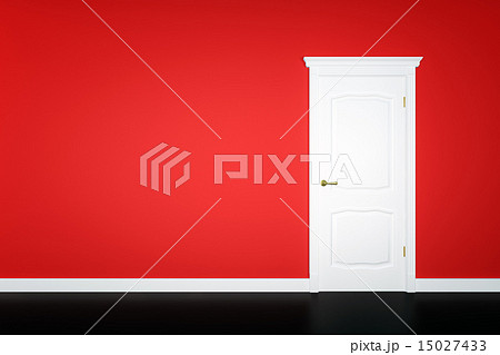 Closed white door on green wall 15027433