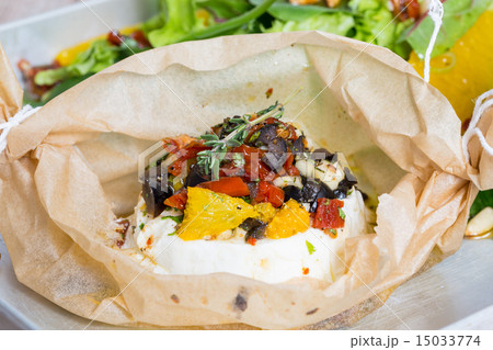 Baked goat cheese Mediterranean in parchment paper Baked goat cheese Mediterranean in parchment paper 15033774