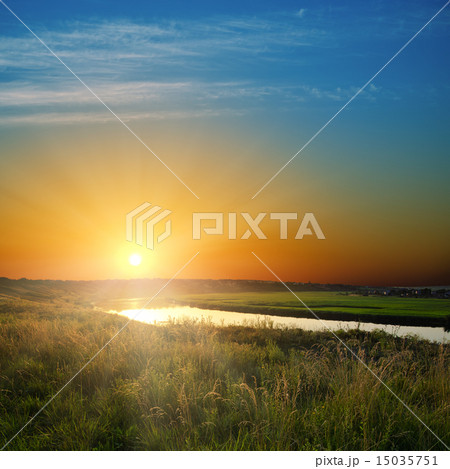 golden sunset over river 15035751