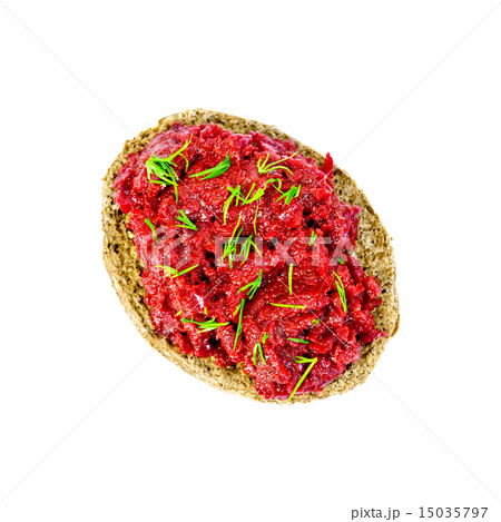 Sandwich with beet caviar and dill on top 15035797