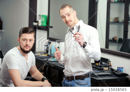 Male customer and a barber at barbershop Male customer and a barber at barbershop 15038565