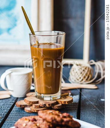 coffee with milk in a glass chocolate chip cookie coffee with milk in a glass chocolate chip cookie 15042281
