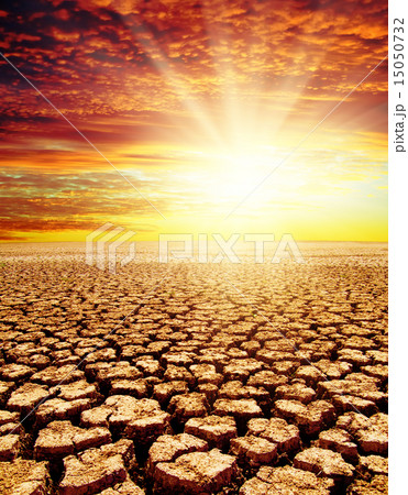 drought land under red sunset 15050732