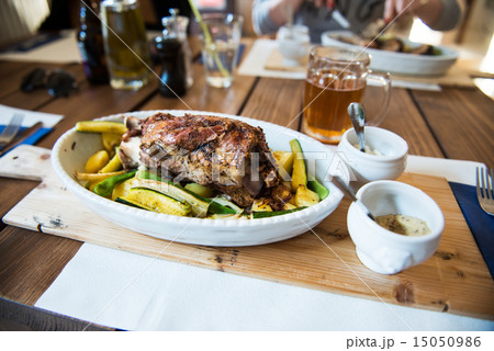 dinner with roasted pork leg dinner with roasted pork leg 15050986