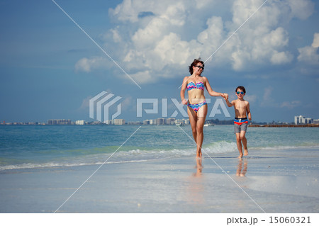 Mother and son on tropical beach Mother and son on tropical beach 15060321