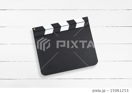 Movie clapper on wooden background Movie clapper on wooden background 15061253