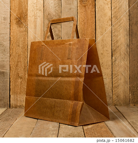 Paper bag on a wooden texture 15061682