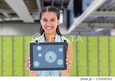 Composite image of student showing tablet pc 15068581