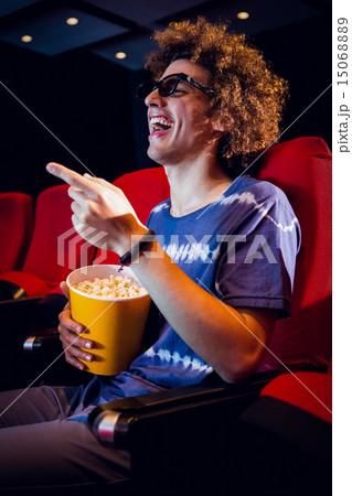 Young man watching a 3d film 15068889
