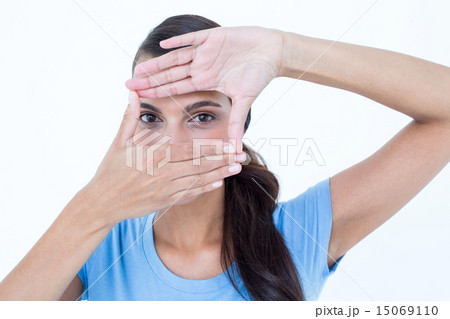 Pretty woman looking through a frame Pretty woman looking through a frame 15069110