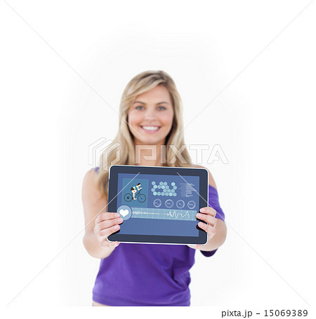 Composite image of tablet computer being held by a blonde woman 15069389