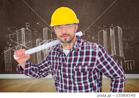 Composite image of handyman holding rolled up blueprint Composite image of handyman holding rolled up blueprint 15069540