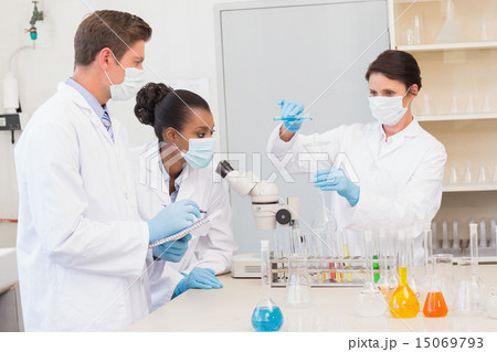 Scientists doing experimentations Scientists doing experimentations 15069793