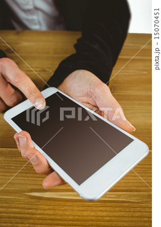 Businesswoman using her tablet pc 15070451