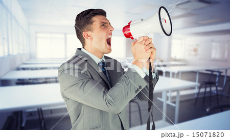 Composite image of businessman with megaphone Composite image of businessman with megaphone 15071820