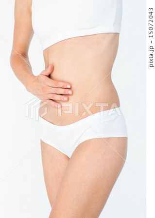 Woman touching her belly 15072043