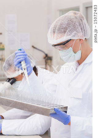 Scientist doing experimentations in tubes 15072483