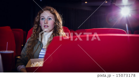 Young woman watching a film 15073178