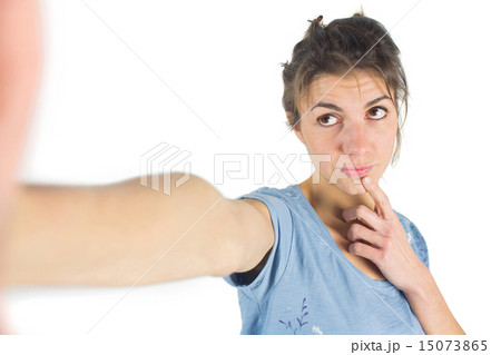 Casual brunette taking a selfie 15073865