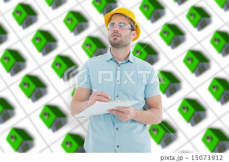 Composite image of supervisor looking away while writing on clip 15073912