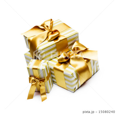 Gold gift boxes isolated on white background Gold gift boxes isolated on white background 15080240
