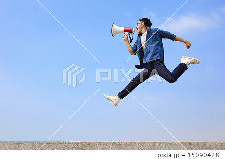 man jump and shout megaphone 15090428