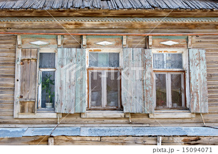 Three old russian style wooden window in Astrakhan, Russia. Urban decay. Heritage. Three old russian style wooden window in Astrakhan, Russia. Urban decay. Heritage. 15094071