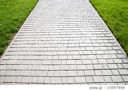 sidewalk between green grass sidewalk between green grass 15097990