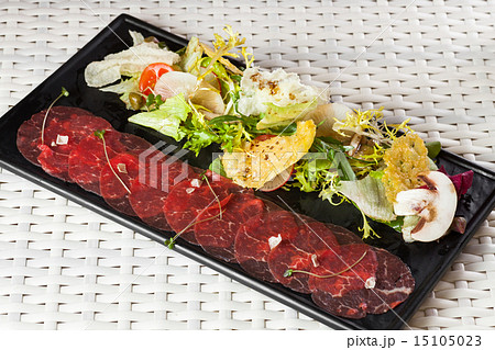 Beef carpaccio with parmesan cheese salad Beef carpaccio with parmesan cheese salad 15105023